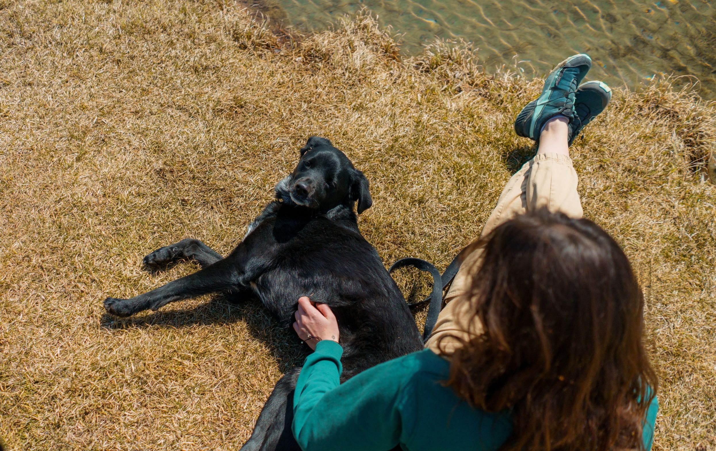 Brandy and her dog on a hike taking a break